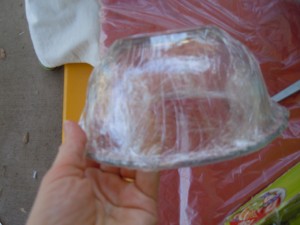 cling-wrap-covered bowl