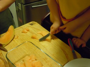 Br cutting up melon