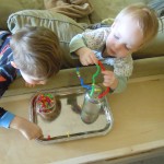 The boys using the fine- motor activity